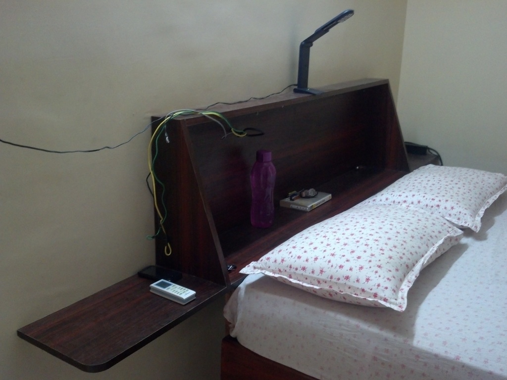 Headboard attached to the wall